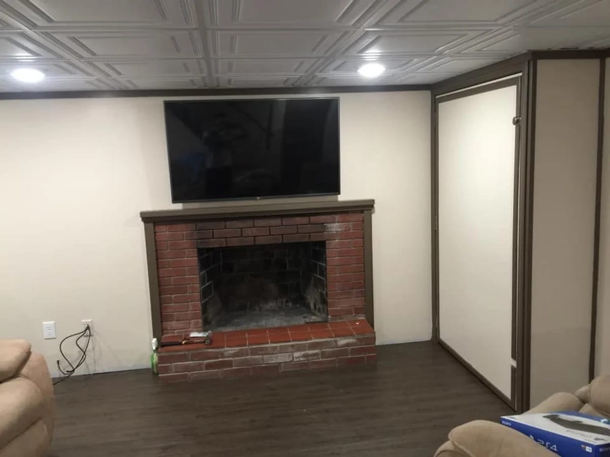 Home theater fireplace setup in Charlton, MA installed by J&S Audio Video Solutions