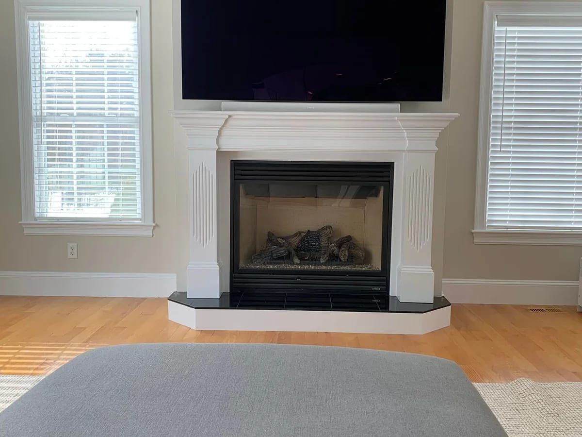 Living room television wall mount in Worcester, MA by J&S Audio Video Solutions