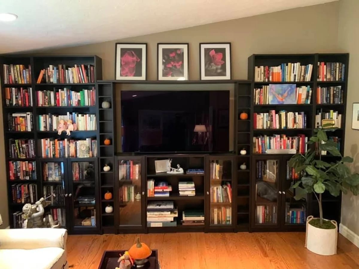 Residential home entertainment with shelving in Northborough, MA by J&S Audio Video Solutions