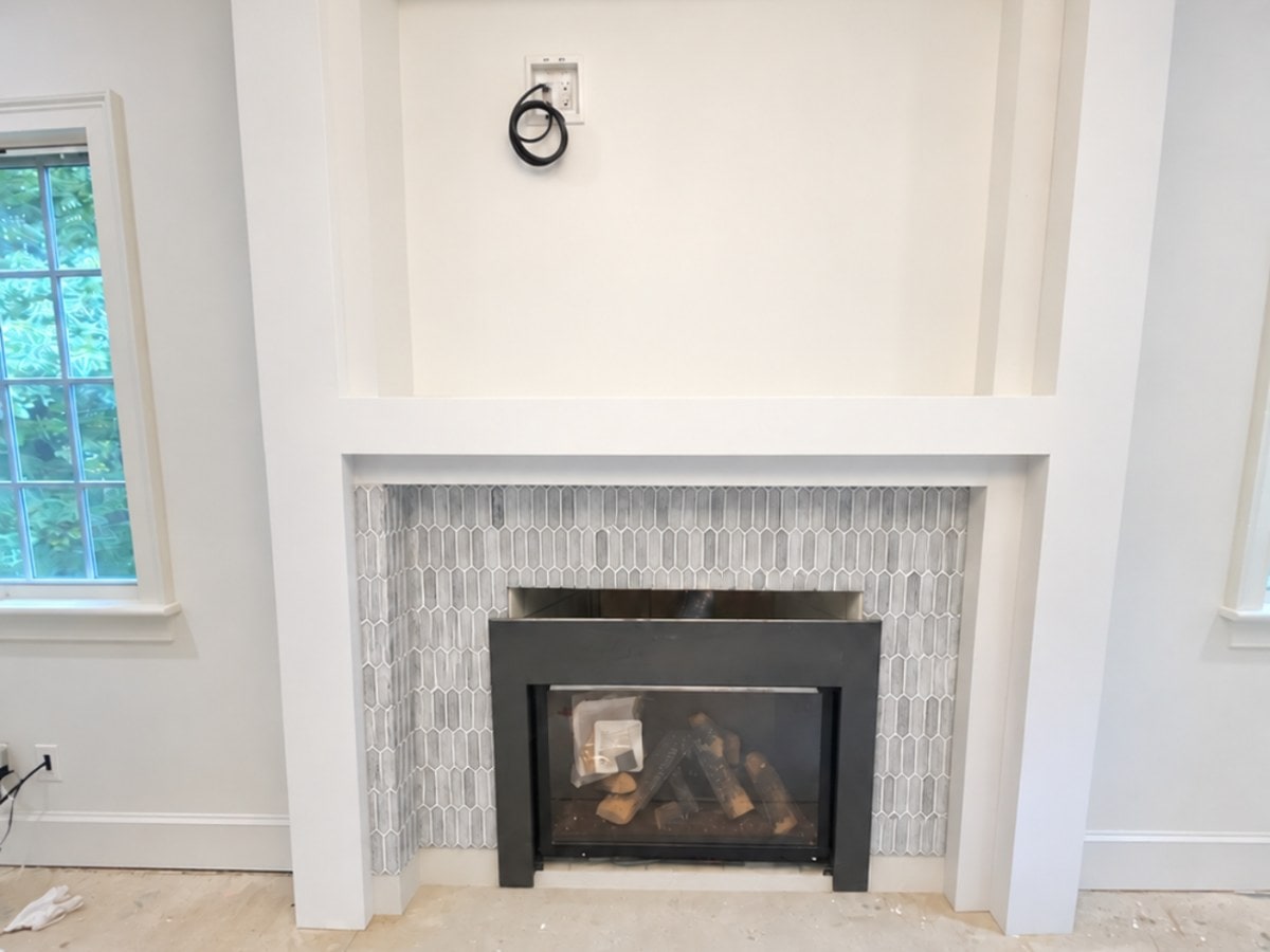 Fireplace wall before the television installation in Westborough, MA